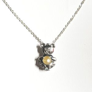 Adorable sterling silver teddy bear necklace ,with a lovely  white pearl.
